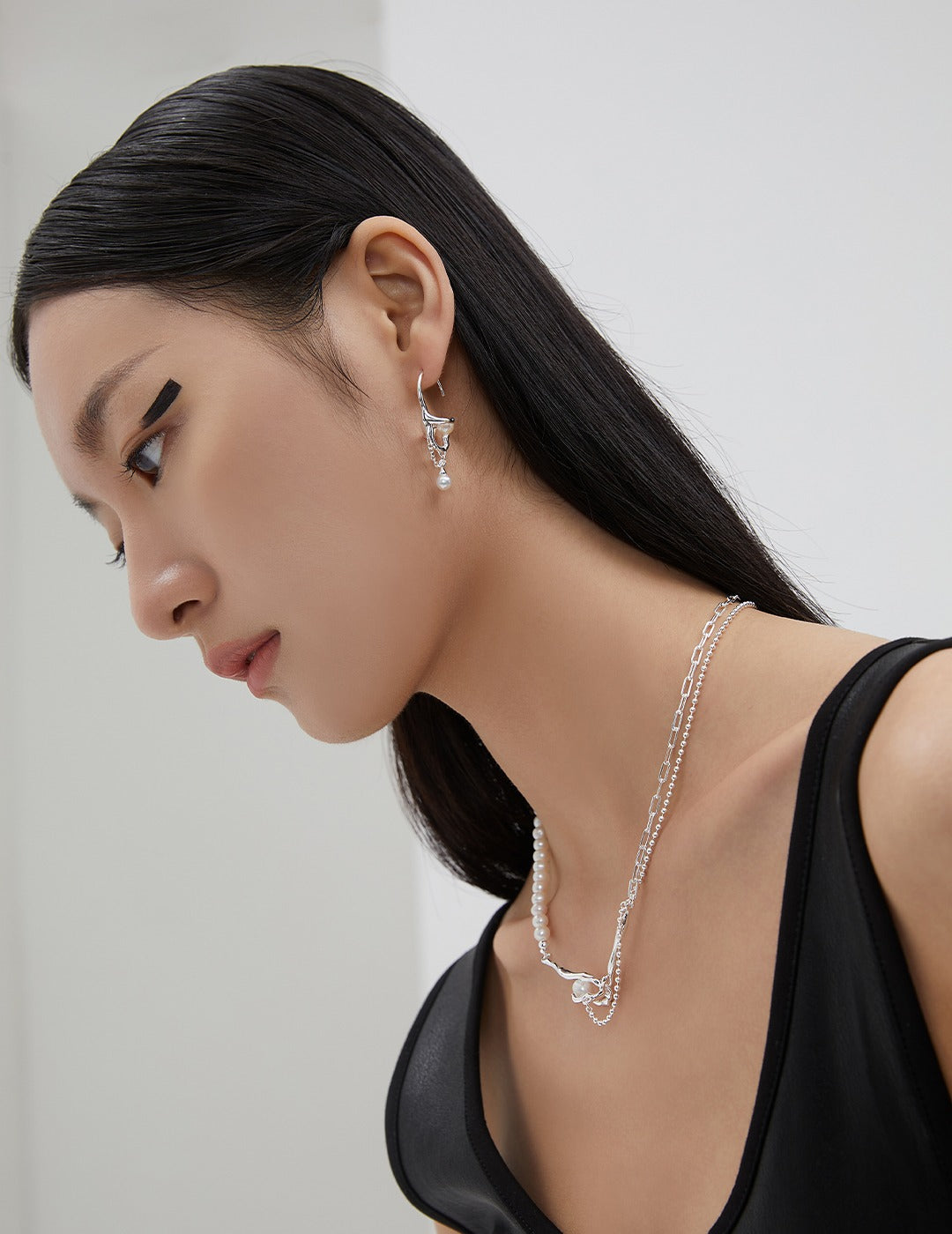DRY NEST SERIES STERLING SILVER ASYMMETRIC EARRINGS