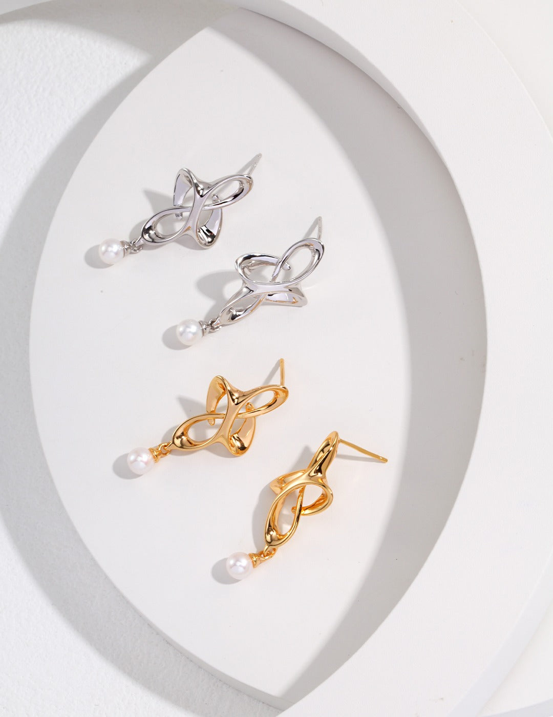 STERLING SILVER PEARL KNOT EARRINGS