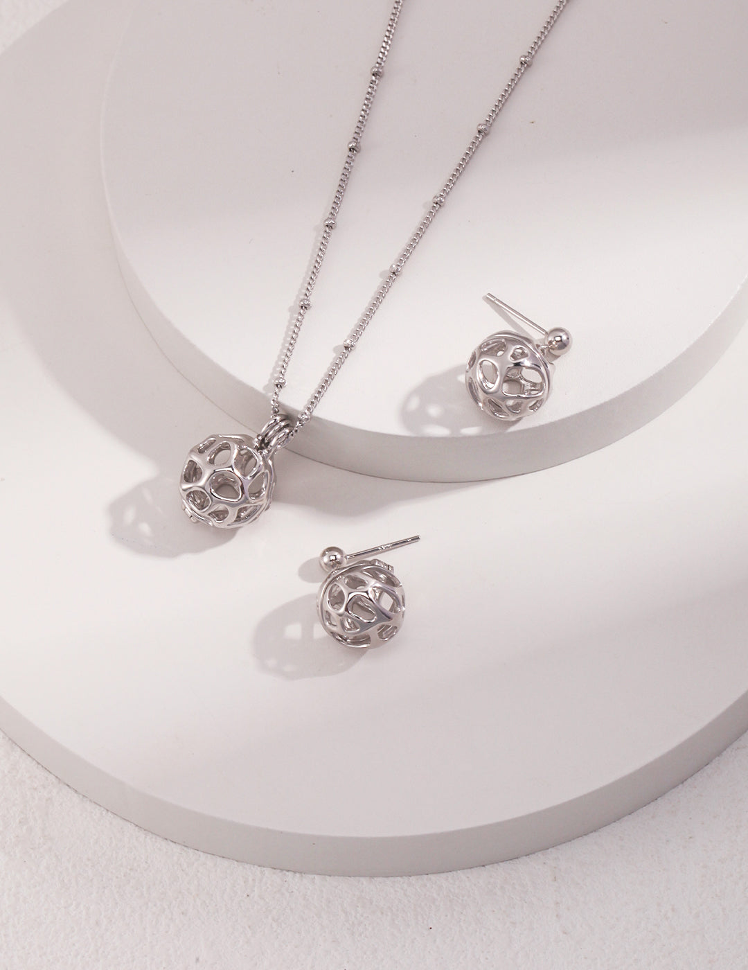 STERLING SILVER FLUID HOLLOW SERIES EARRINGS