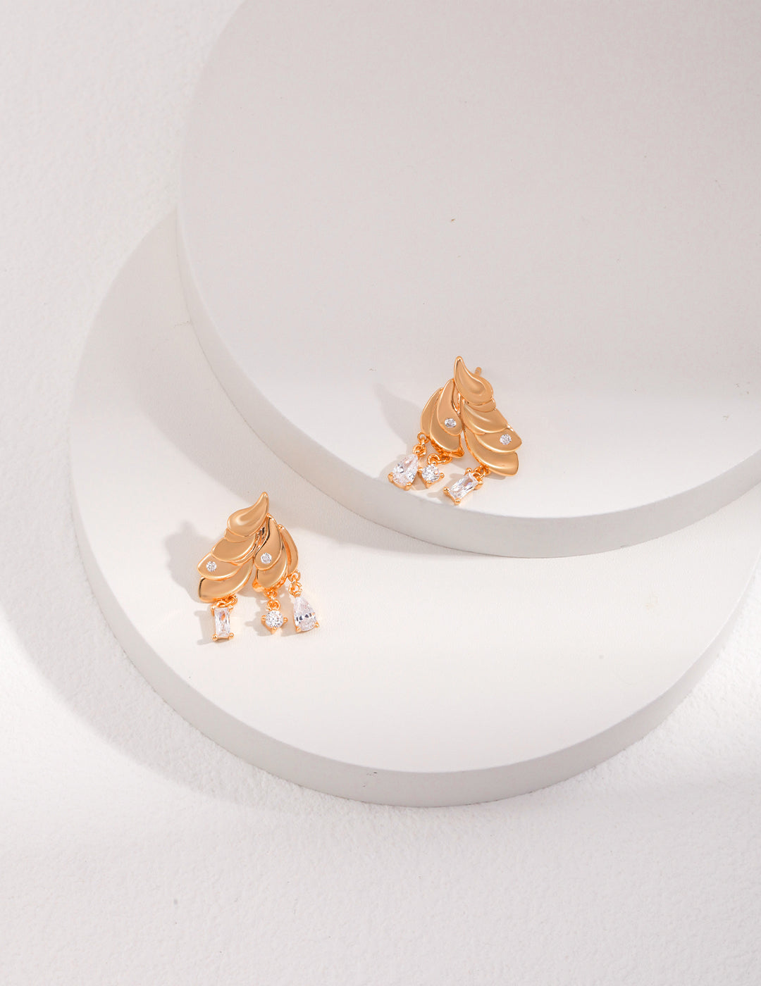 ELEGANT TIERED FEATHER ZIRCON STUDDED EARRINGS IN STERLING SILVER