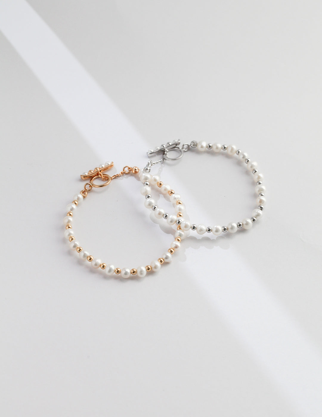 STERLING SILVER TWO-TONE PEARL BRACELET