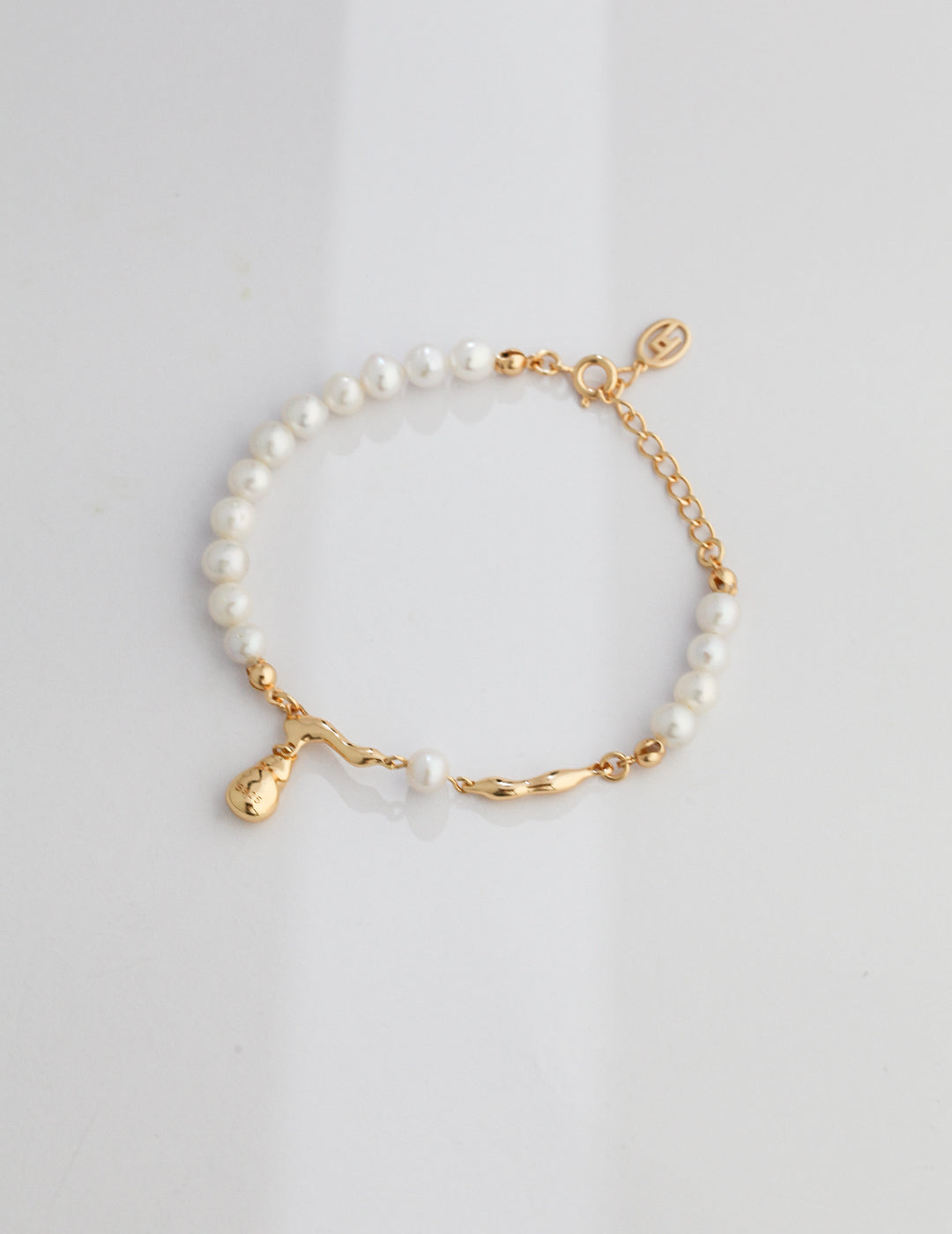 STERLING SILVER PEARL DROP BRACELET