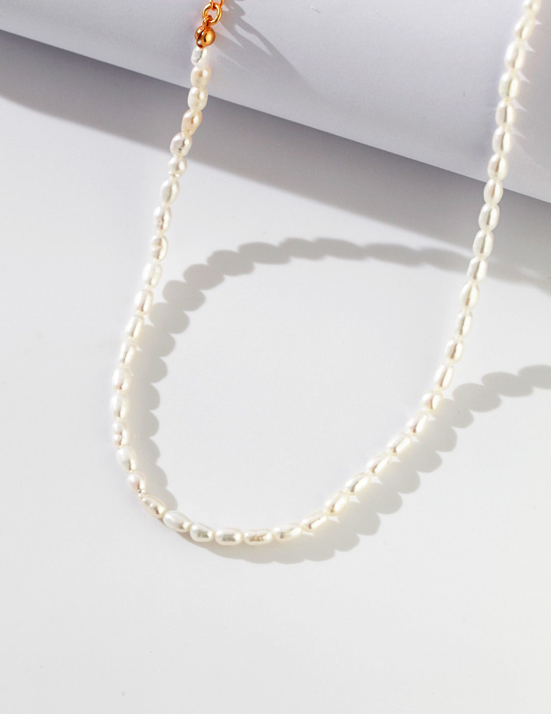 STERLING SILVER NATURAL RICE PEARL NECKLACE