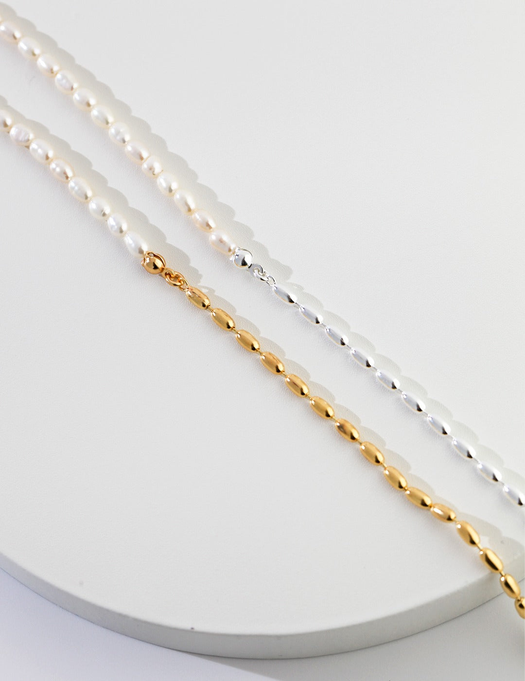 STERLING SILVER TWO-TONE RICE PEARL NECKLACE