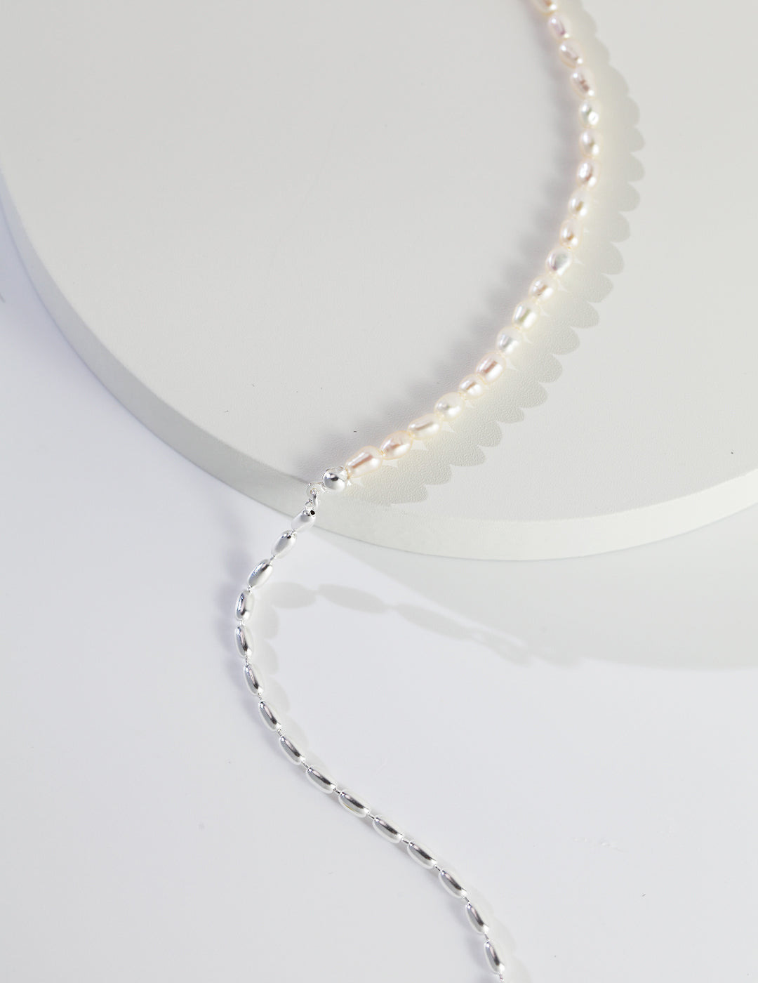 STERLING SILVER TWO-TONE RICE PEARL NECKLACE