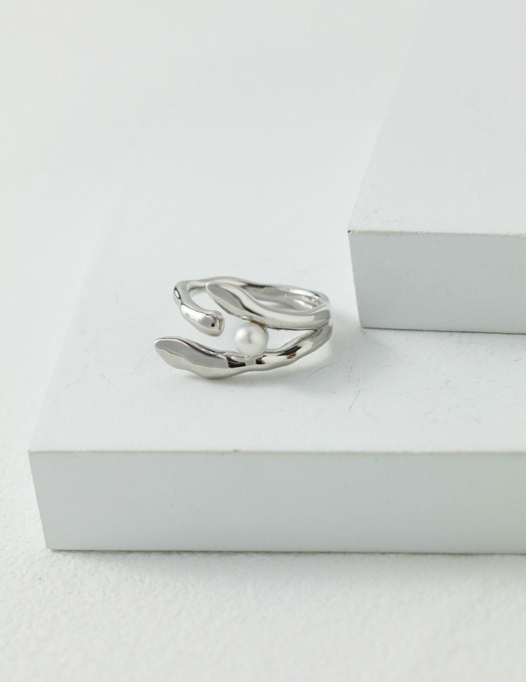 STERLING SILVER PEARL CROSSOVER RING