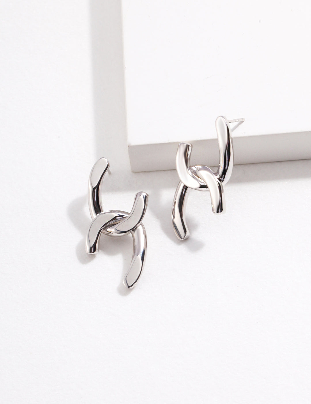 STERLING SILVER GEOMETRIC ENTWINED STUD EARRINGS