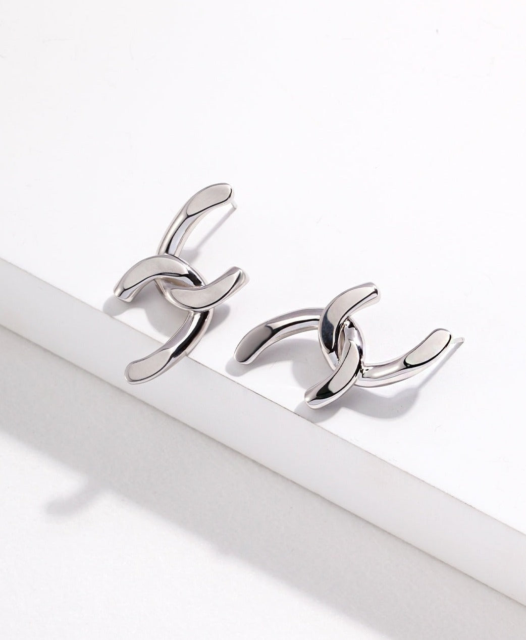 STERLING SILVER GEOMETRIC ENTWINED STUD EARRINGS