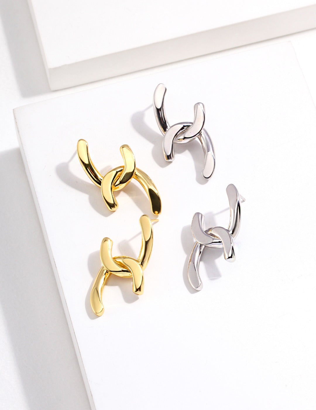 STERLING SILVER GEOMETRIC ENTWINED STUD EARRINGS