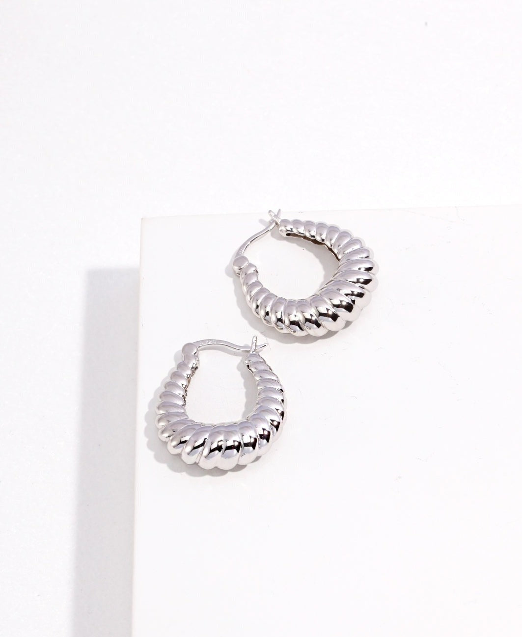 STERLING SILVER TWISTED HOOP EARRINGS