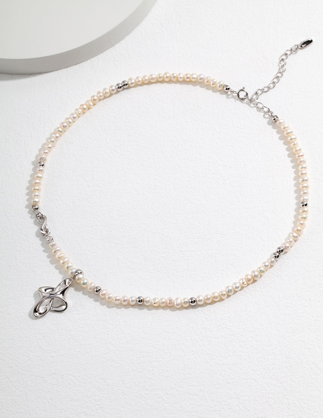 STERLING SILVER PEARL KNOT NECKLACE