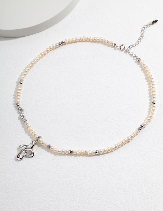 STERLING SILVER PEARL KNOT NECKLACE