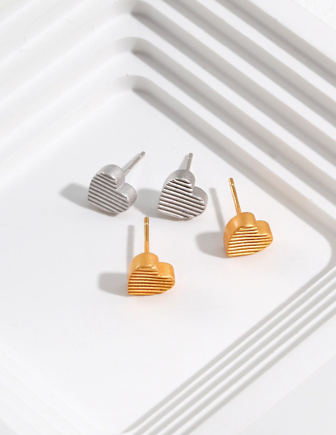 STERLING SILVER THREADED LOVE STUD EARRINGS