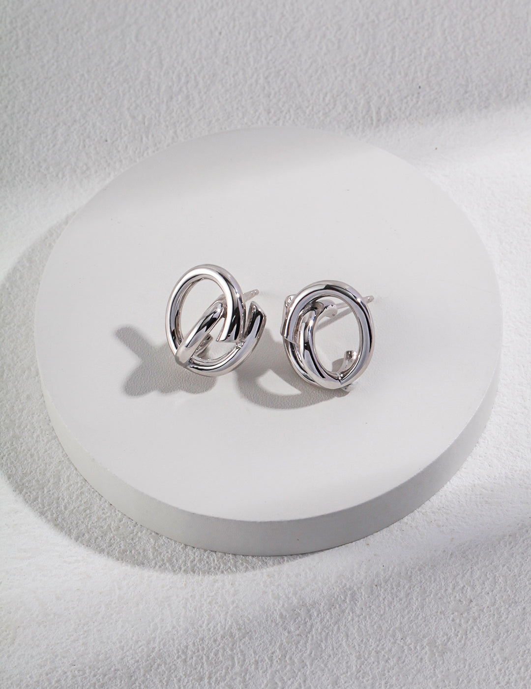 STERLING SILVER TWISTED KNOT STUD EARRINGS