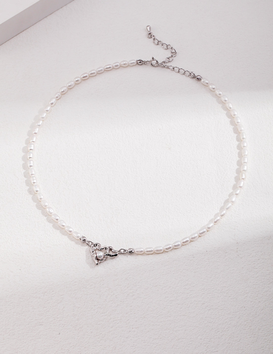 STERLING SILVER LOVE INTERTWINED NATURAL PEARL NECKLACE